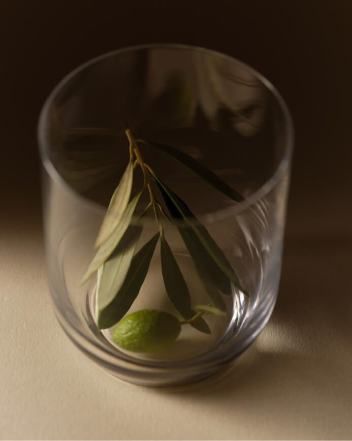 Glass with an olive inside